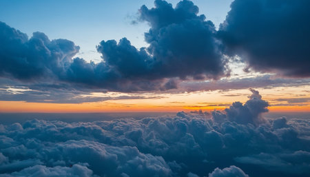 Cloudscape, Colored Clouds at Sunset near the Ocean, View from the Airplaneの素材