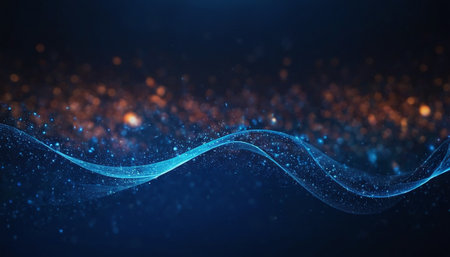 abstract glowing particles with bokeh effect on dark blue backgroundの素材