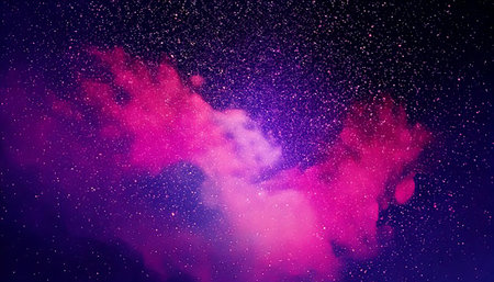 Purple and pink nebula with stars on a dark background.の素材