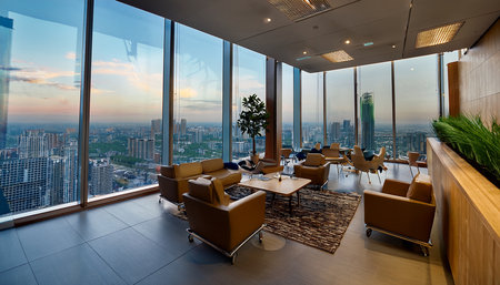 Luxury hotel lobby with a panoramic view of the cityの素材