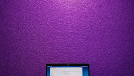 Apple iPad Air 2 on purple background. iPad Air was created and developed by the Apple inc.の素材