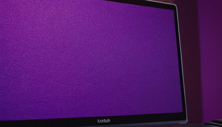 Purple screen of modern laptop computer with blank space for text.の素材