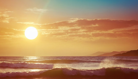 Sunset over the sea. Seascape with waves and sunの素材