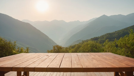 Empty wooden table top with mountain view background. Ready for product display montageの素材