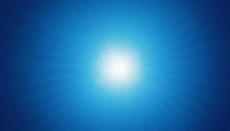 abstract background with lens flare and rays of light in blue skyの素材