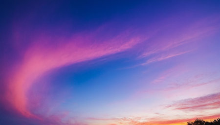 Colorful sunset sky with clouds. Nature background. Panoramic image.の素材