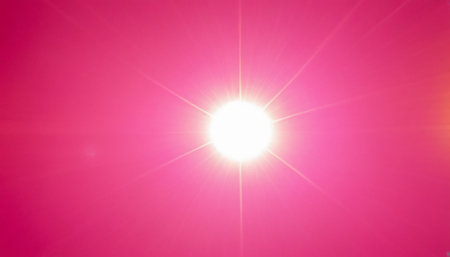 sunbeams with lens flare effect in pink tone. Abstract background.の素材
