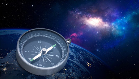 Compass on the background of space. Elements of this image furnished by NASAの素材