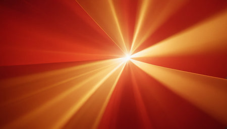 abstract sun with rays and bokeh in red and yellowの素材