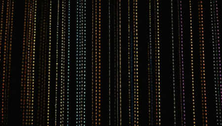 Abstract background with multicolored lines on a black background. Texture.の素材