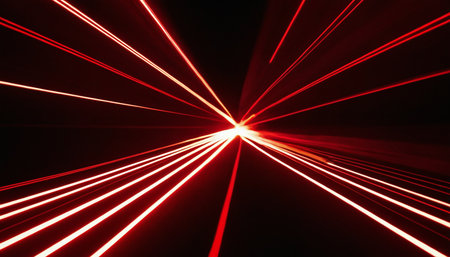 abstract scene of a long exposure of red laser rays in a tunnelの素材