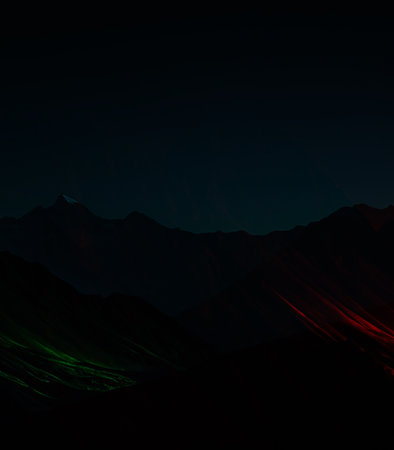 Mountain landscape with red and green lights. Computer generated image.の素材