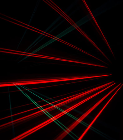 abstract background with glowing lines in red and blue colors on blackの素材