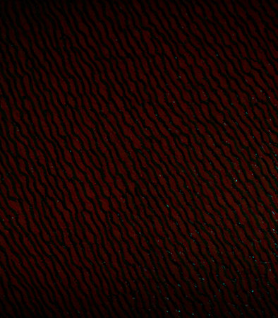 abstract background with a pattern of black lines on a red backgroundの素材