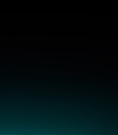 Abstract dark blue background with a gradient in the center of the imageの素材