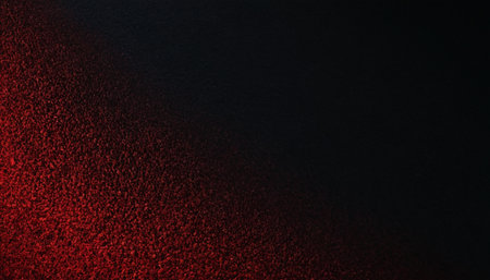 Abstract red and black background with grunge texture and copy space.の素材