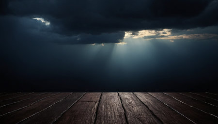 Dark stormy sky with dark clouds and wooden planks floor backgroundの素材