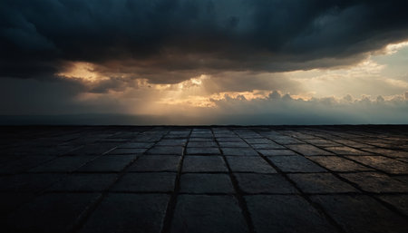 Dark stormy sky over the roof of a house with paving slabsの素材