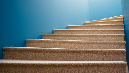 staircase in blue wall, closeup of photo with copy spaceの素材