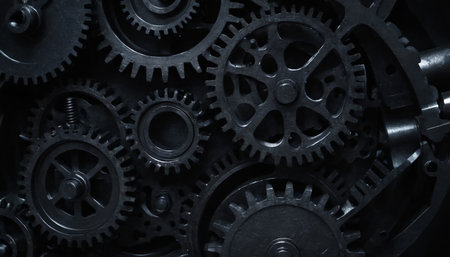 Metal gears background, closeup of metal cogwheels, industrial backgroundの素材