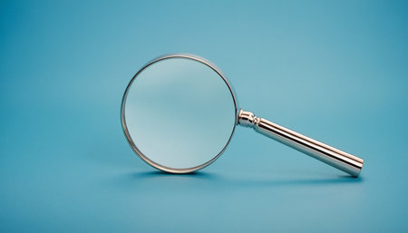 Magnifying glass on blue background. Magnifying glass on blue background.の素材