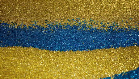 Ukrainian flag on golden glitter background. Blue and gold colorの素材
