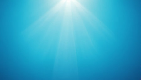 Blue sky with sun rays and lens flare effect. Abstract background.の素材