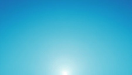 Blue sky background with tiny clouds and sun. Abstract blue sky backgroundの素材