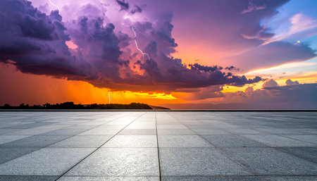 Empty square floor and dramatic sky with lightning at sunset. Perspective view.の素材