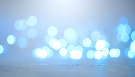 blue bokeh abstract light background. christmas and new year conceptの素材