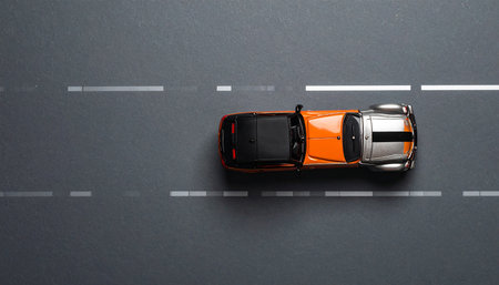 Top view of a car on the road. 3d rendering.の素材