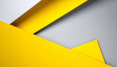 Yellow and grey paper background with copy space for text or image.の素材