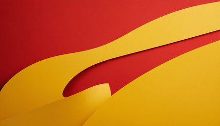 Abstract background of red and yellow curved paper sheets. Copy space.の素材