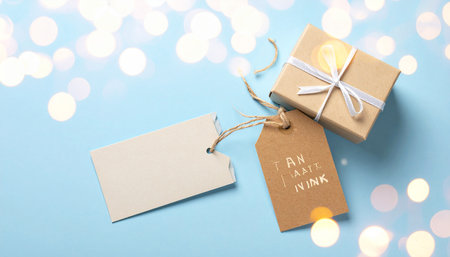 Glasses of white wine with golden bokeh on background.の素材