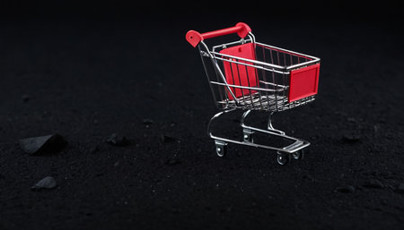 Shopping cart on a black background. Business and finance concept.の素材