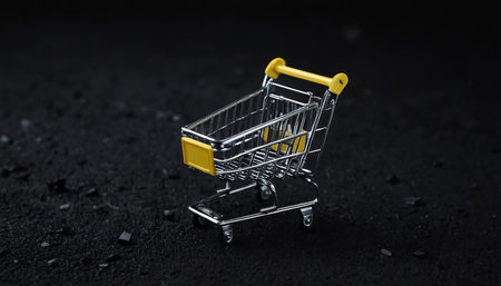 Shopping cart on a black background. 3d render illustration.の素材