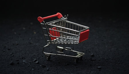 Shopping cart on a black background. 3D illustration. Selective focus.の素材