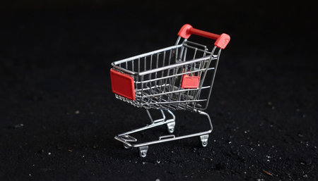 Miniature Shopping Cart on Black Background, Shallow Depth of Fieldの素材