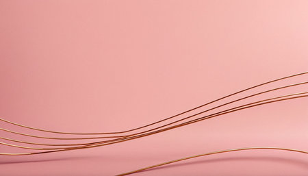 Golden wire on pink background. Minimal style. Copy space.の素材