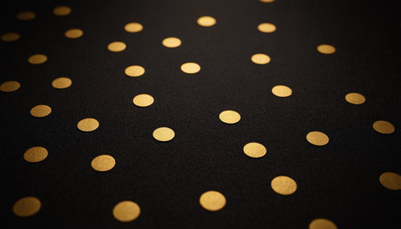 Gold confetti on a black background. Festive background with golden confetti.の素材
