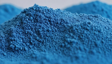 close up of a pile of blue pigment powder on a white backgroundの素材