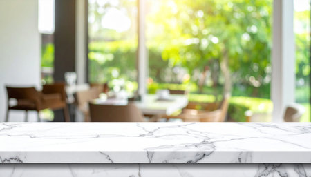 Empty white marble table top and blur restaurant background.For product displayの素材