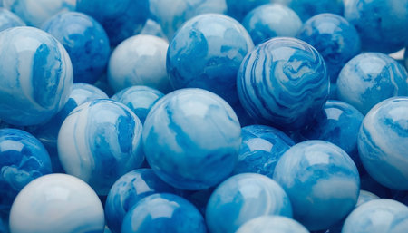 Blue marbles background. Close up blue marbles background texture.の素材