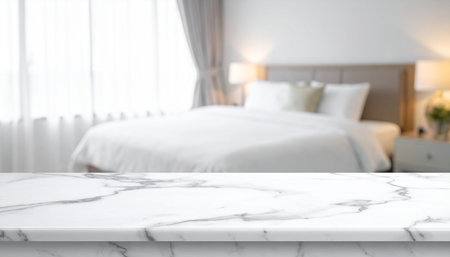 White marble table top with blur bedroom interior background - can be used for display or montage your productsの素材