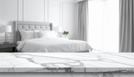 White marble table top with blur bedroom interior background - can be used for display or montage your productsの素材