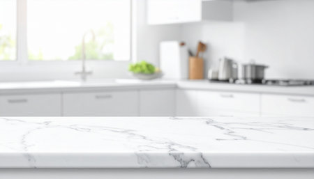 White marble table top on blurred kitchen background, product display montageの素材