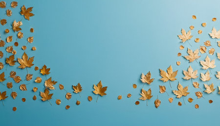 Autumn leaves on blue background. Flat lay, top view.の素材