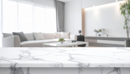 White marble table top with blur living room background, product display montageの素材