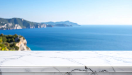 White marble table top with sea and mountain view background. For product displayの素材