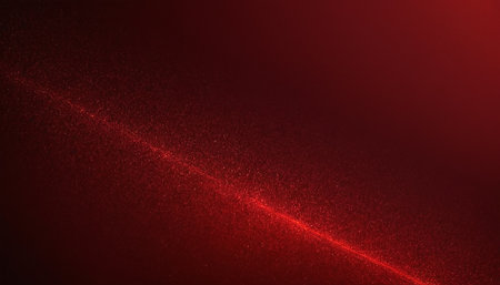 Abstract red background with some smooth lines and sparkles on it.の素材